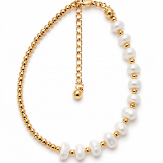 A gold-colored necklace with a row of white pearls and a clasp at the end.