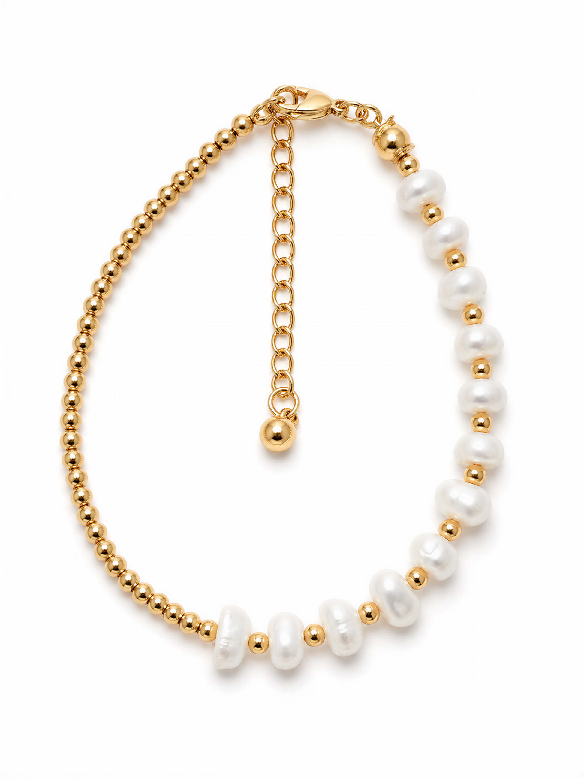 A gold-colored necklace with a row of white pearls and a clasp at the end.