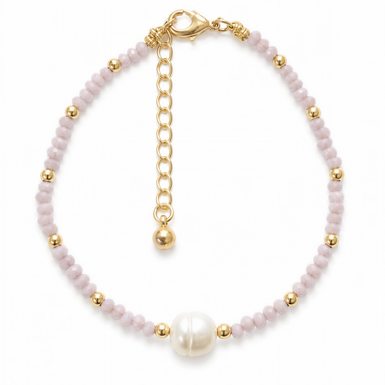 A delicate necklace with a combination of pink beads and a large white pearl at the center.