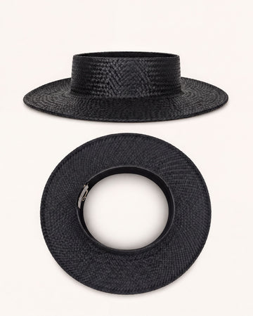 a black straw hat with a round brim and a silver buckle.