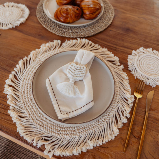 Cotton Macrame Napkins and Rings Set of 6 handmade by Village Thrive using natural materials.
