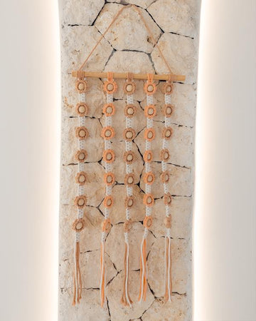 Flora Macrame Wall Hanging handmade by Village Thrive using natural materials.