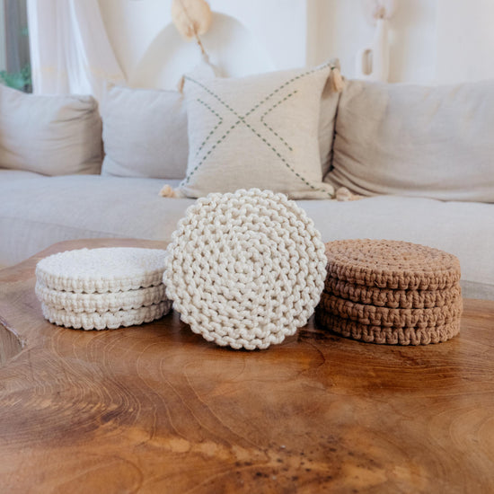 Braided Macrame Coasters Set of 4 handmade by Village Thrive using natural materials.