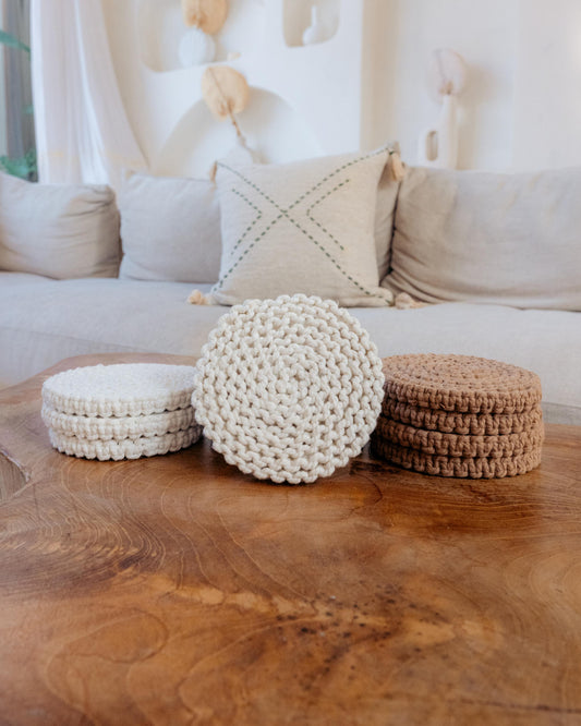 Braided Macrame Coasters Set of 4 handmade by Village Thrive using natural materials.