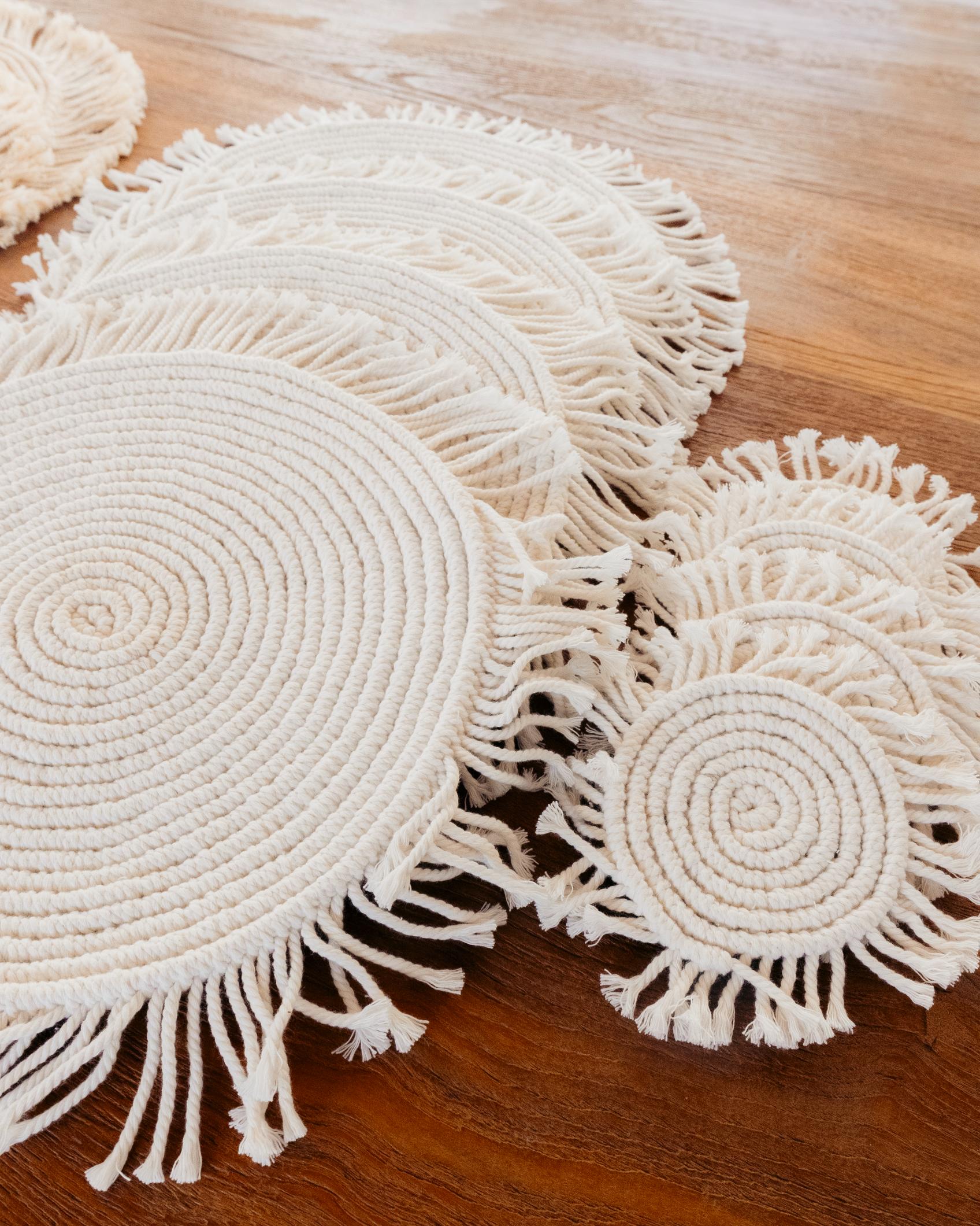 Round Macrame Placemat and Coaster Set of 4 handmade by Village Thrive using natural materials.