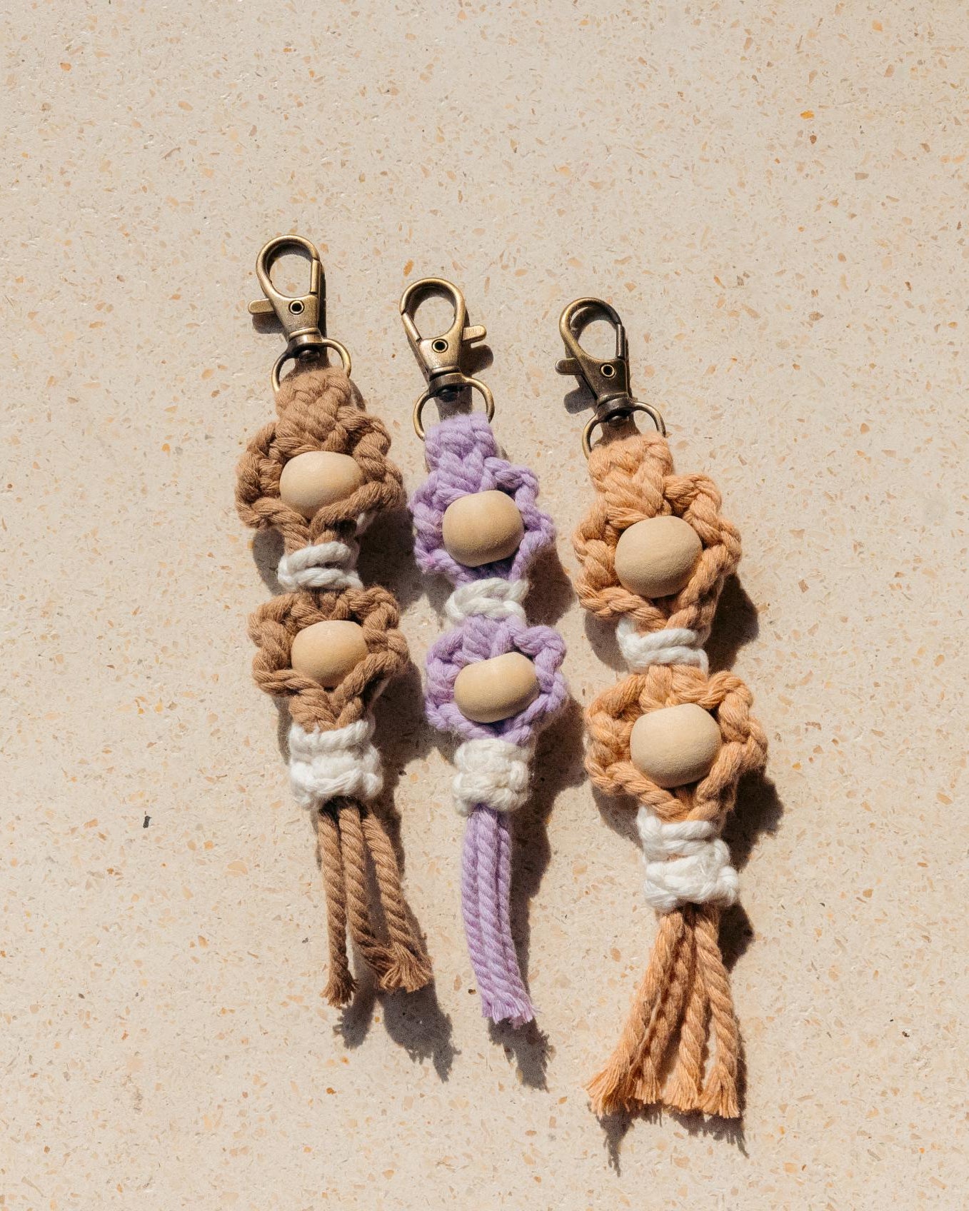 Flora Macrame Keychain handmade by Village Thrive using natural materials.