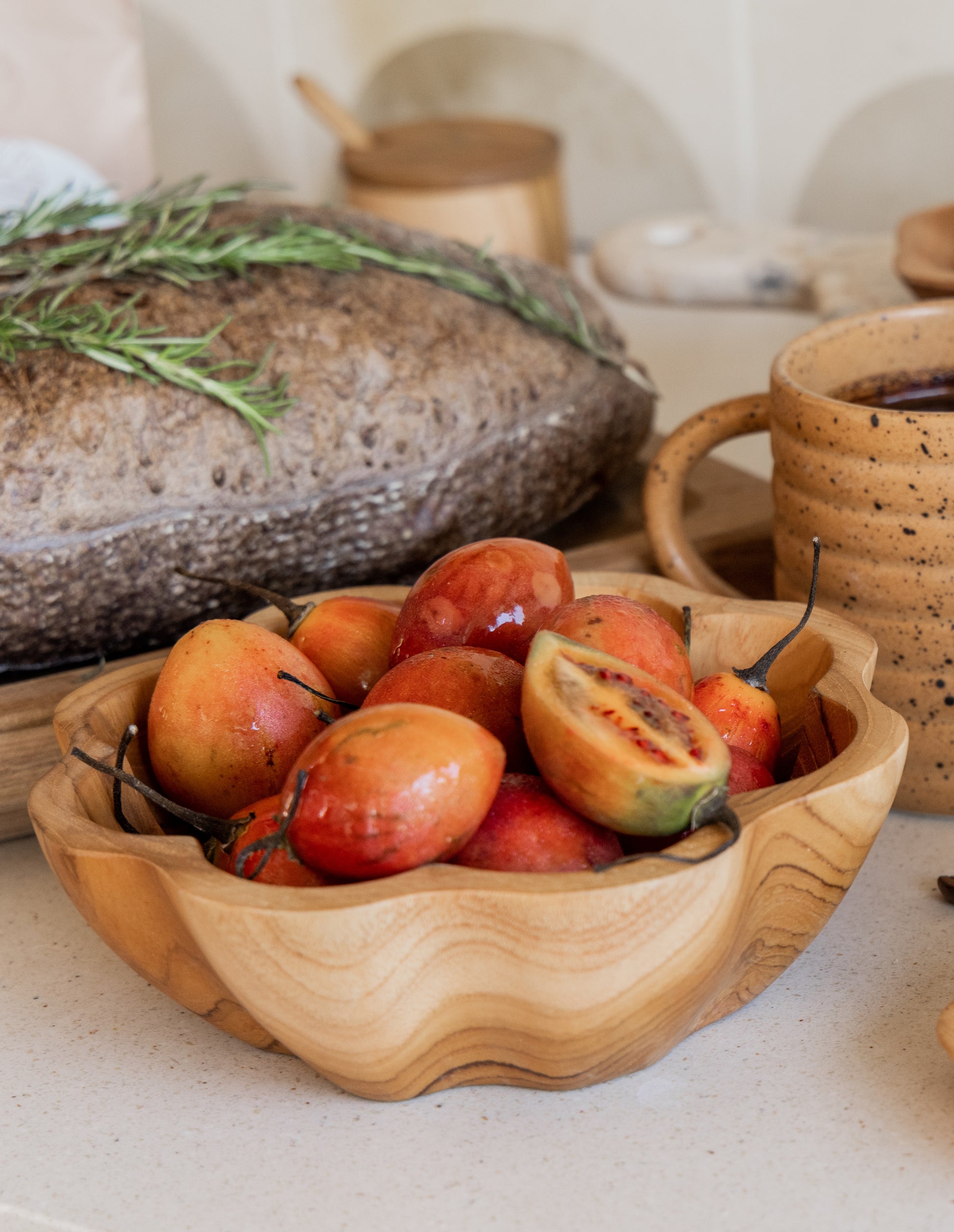 Flora Teak Bowl handmade by Village Thrive using natural materials.