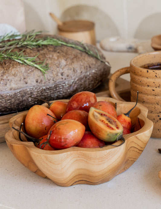 Flora Teak Bowl handmade by Village Thrive using natural materials.