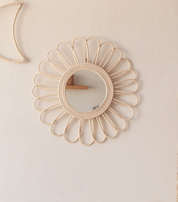 Bloom Rattan Mirror handmade by Village Thrive using natural materials.