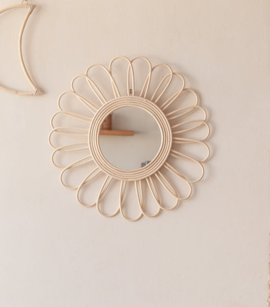 Bloom Rattan Mirror handmade by Village Thrive using natural materials.