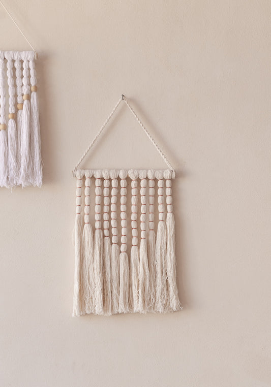 Dasi Cotton Wall Hanging handmade by Village Thrive using natural materials.