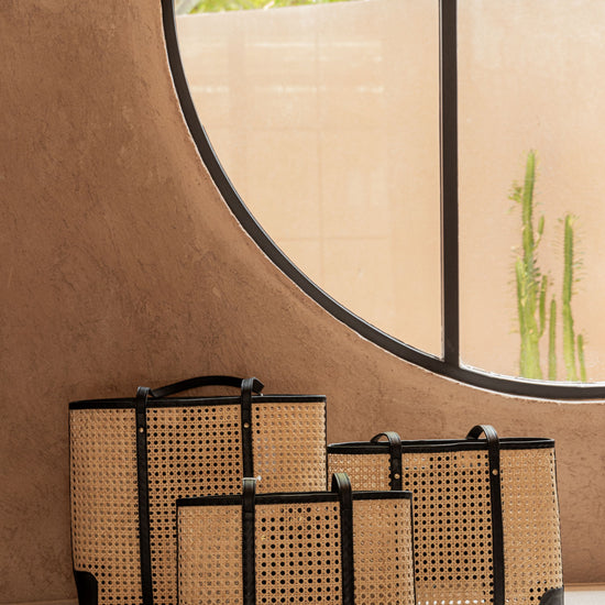 Dian Leather and Rattan Tote Bag handmade by Village Thrive using natural materials.