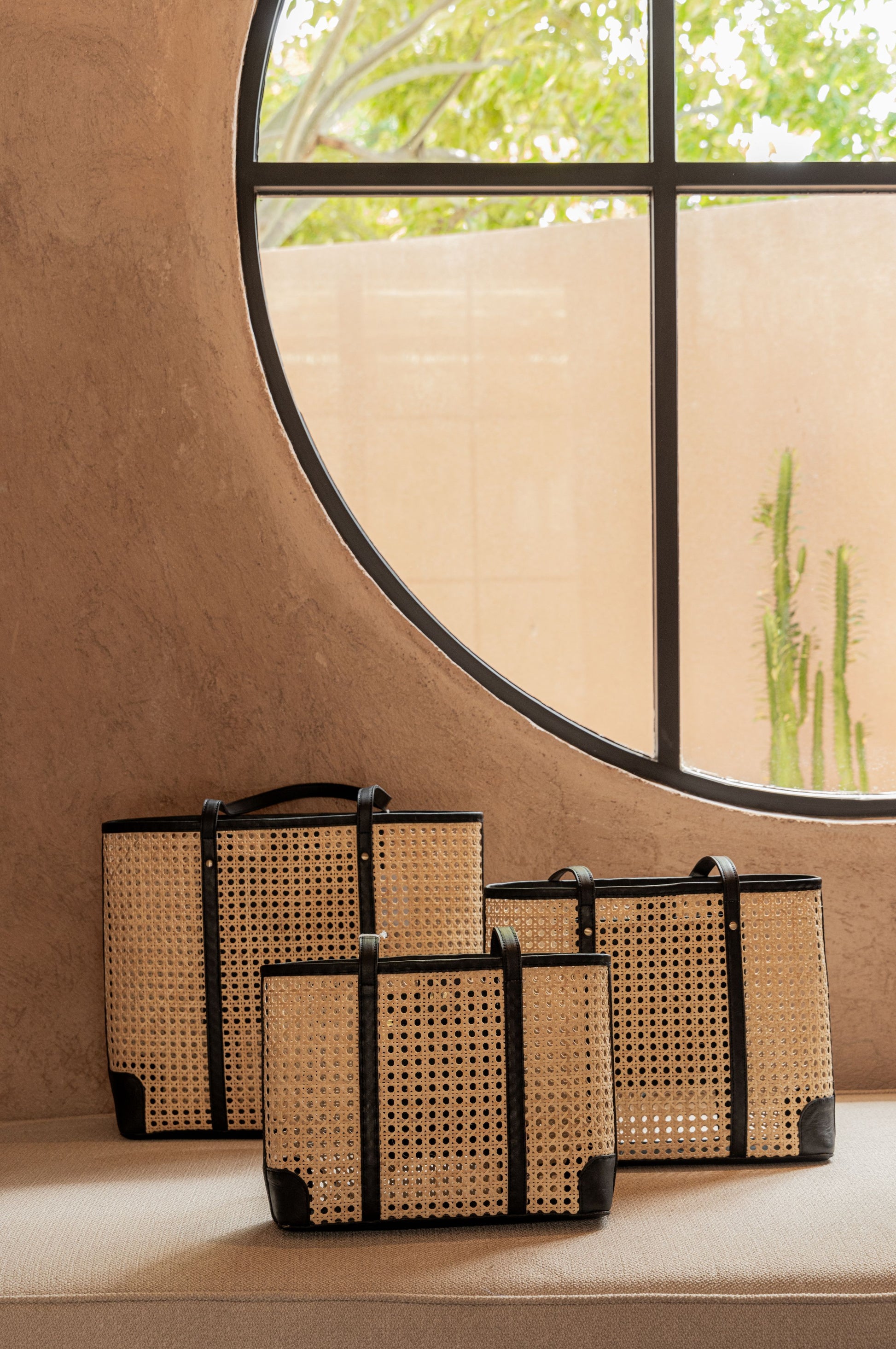 Dian Leather and Rattan Tote Bag handmade by Village Thrive using natural materials.
