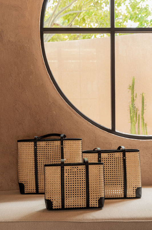 Dian Leather and Rattan Tote Bag handmade by Village Thrive using natural materials.