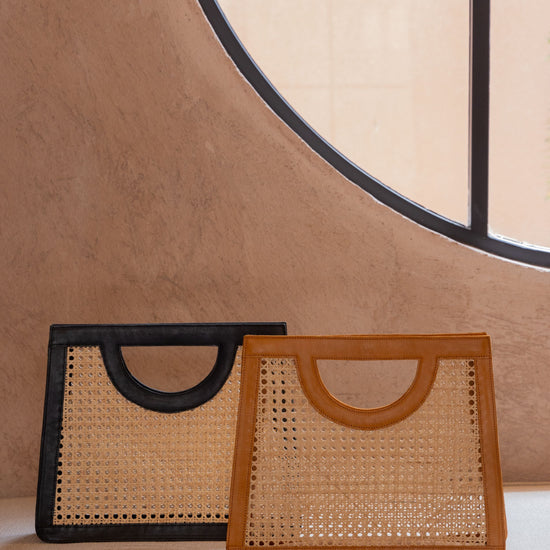 Cora Leather and Rattan Handbag handmade by Village Thrive using natural materials.