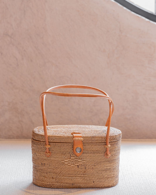 Opal Rattan Purse handmade by Village Thrive using natural materials.