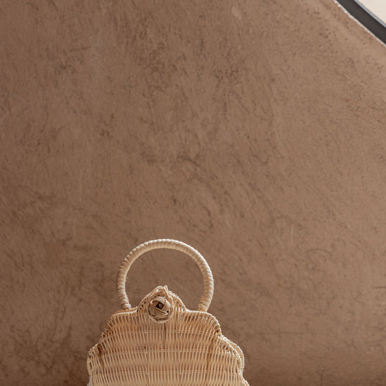 Kids Rattan Shell Purse handmade by Village Thrive using natural materials.