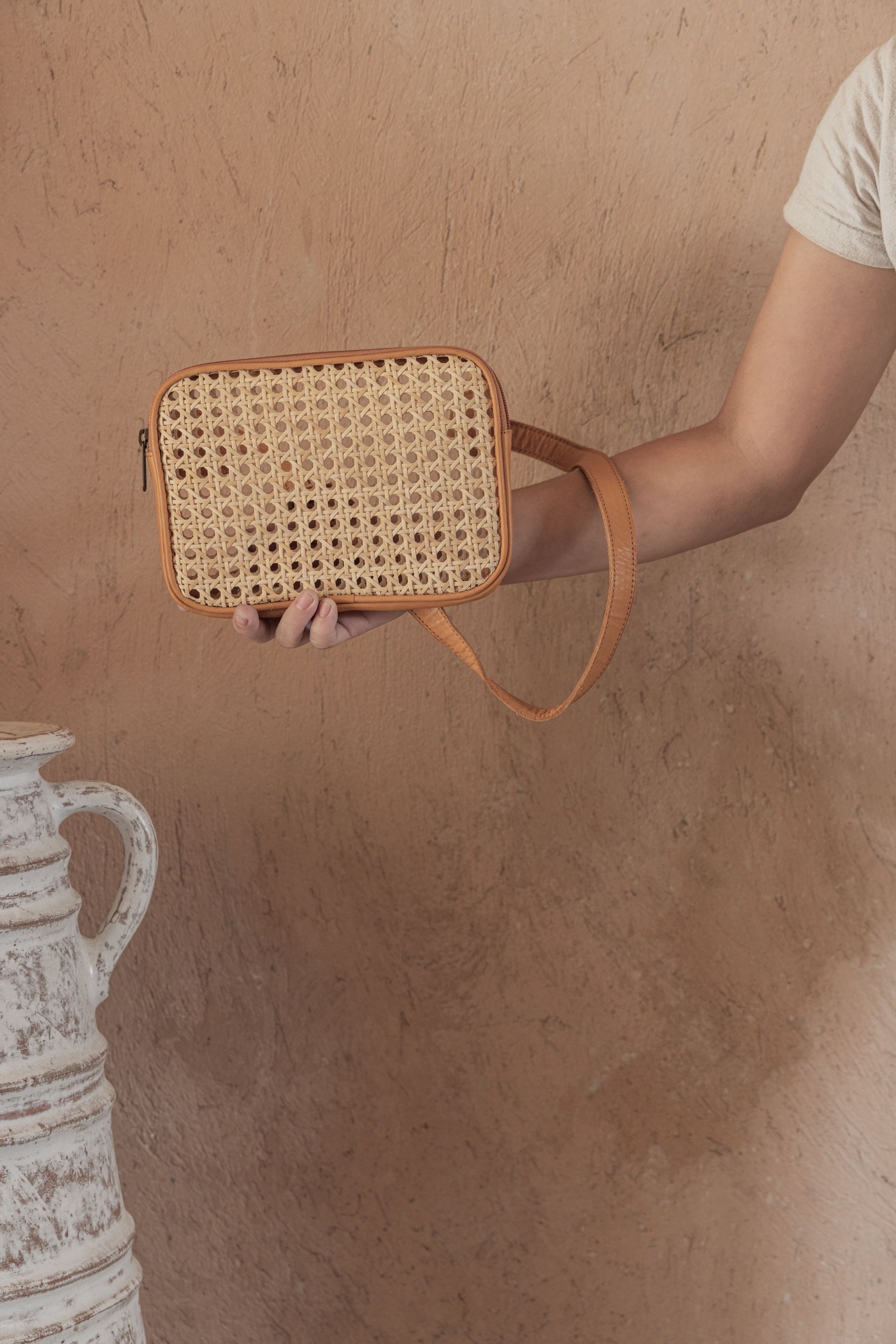 Vera Leather and Cane Belt Bag handmade by Village Thrive using natural materials.