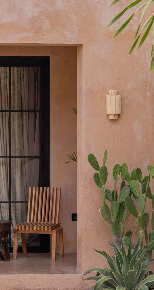 Maya Rattan Wall Sconce PREORDER handmade by Village Thrive using natural materials.