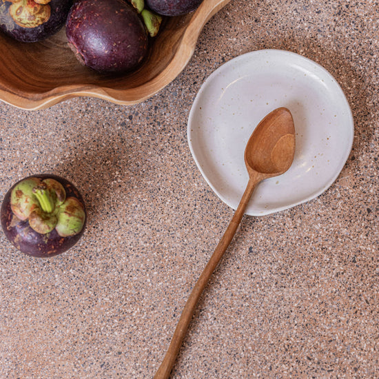 Wabi Ceramic Spoon Rest handmade by Village Thrive using natural materials.