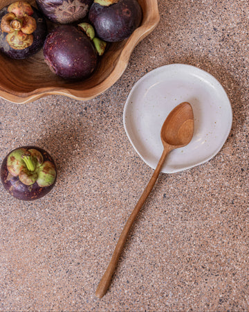 Wabi Ceramic Spoon Rest handmade by Village Thrive using natural materials.