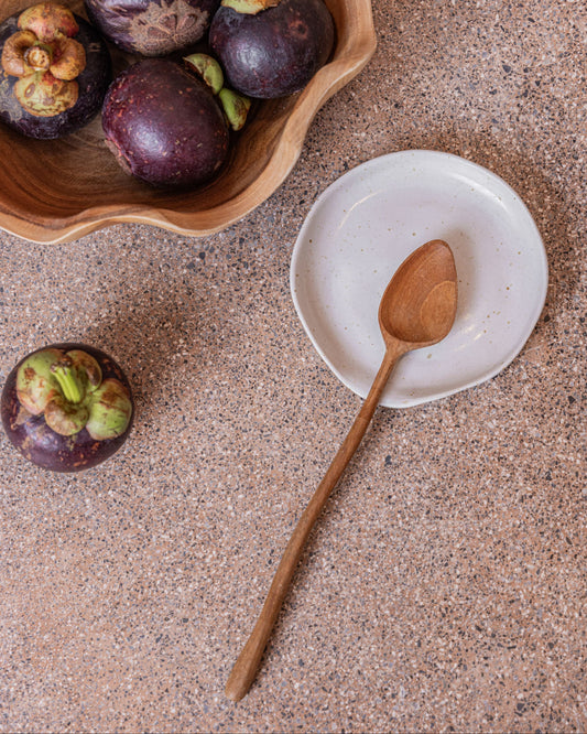 Wabi Ceramic Spoon Rest handmade by Village Thrive using natural materials.
