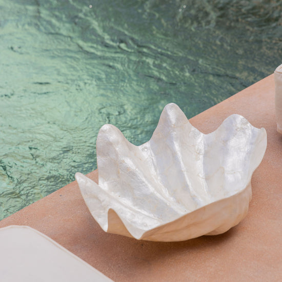 Clam Shell Bowl handmade by Village Thrive using natural materials.