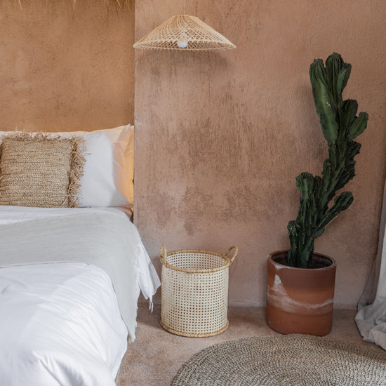 Woven Rattan Lighting Pendant PREORDER handmade by Village Thrive using natural materials.