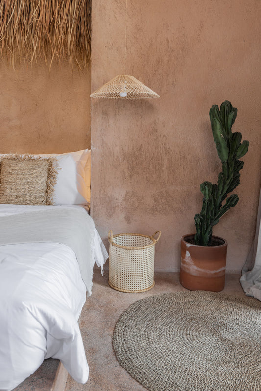 Woven Rattan Lighting Pendant PREORDER handmade by Village Thrive using natural materials.
