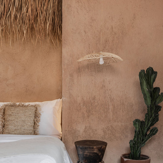 Wavy Minimal Rattan Lighting Pendant PREORDER handmade by Village Thrive using natural materials.