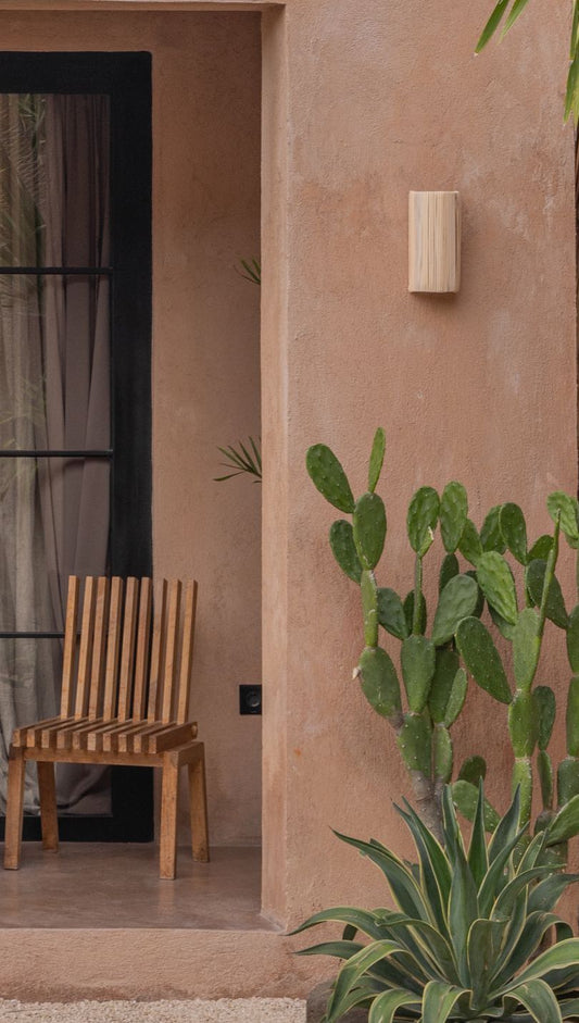 Modern Rattan Wall Sconce PREORDER handmade by Village Thrive using natural materials.