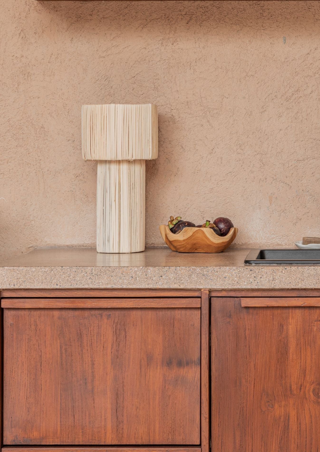 Lea Rattan Table Lamp PREORDER handmade by Village Thrive using natural materials.