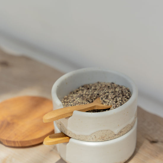 Imperfect Wabi Ceramic Salt & Pepper Holder handmade by Village Thrive using natural materials.