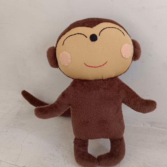 Monkey Stuffed Animal handmade by Village Thrive using natural materials.