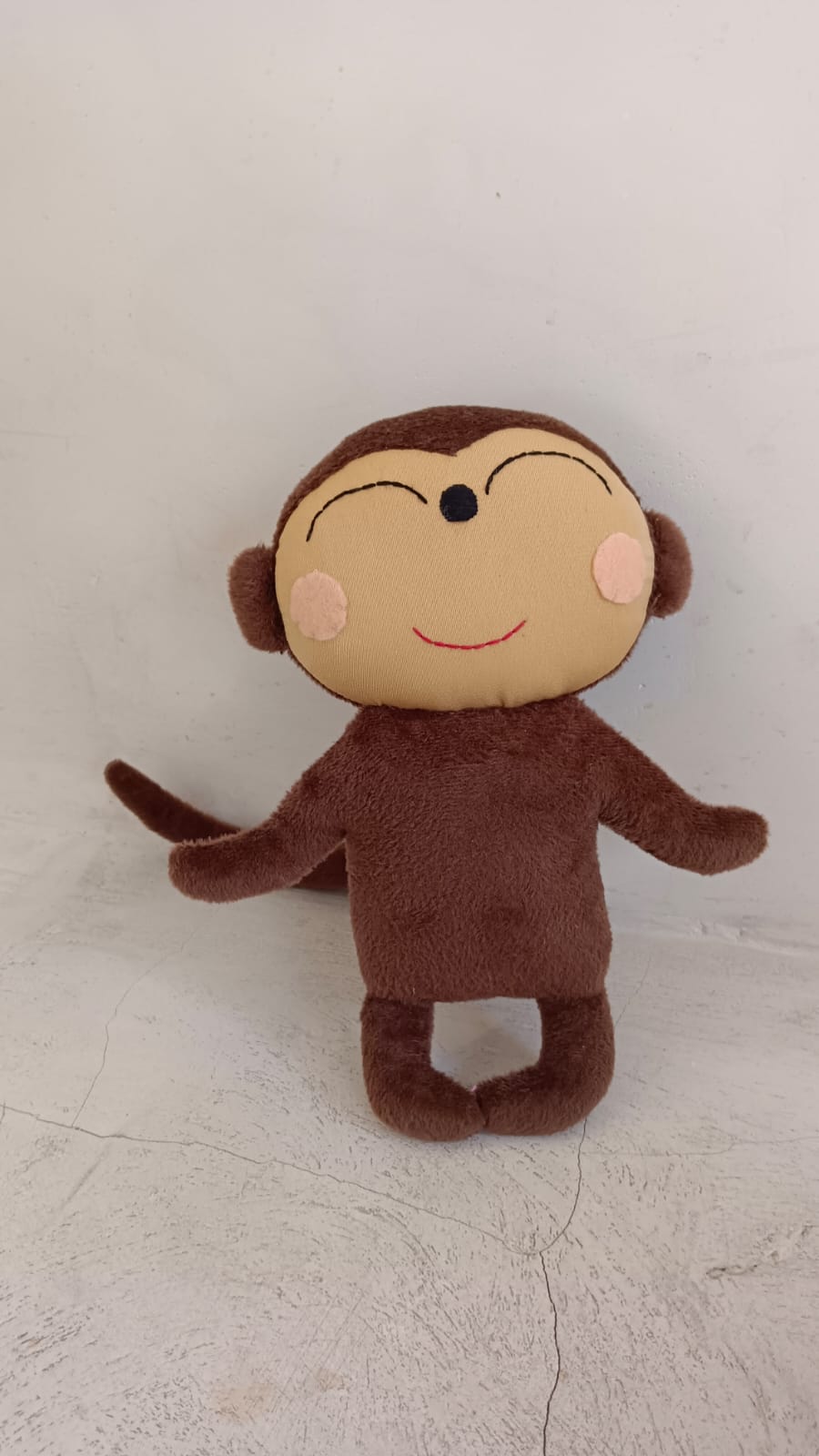 Monkey Stuffed Animal handmade by Village Thrive using natural materials.