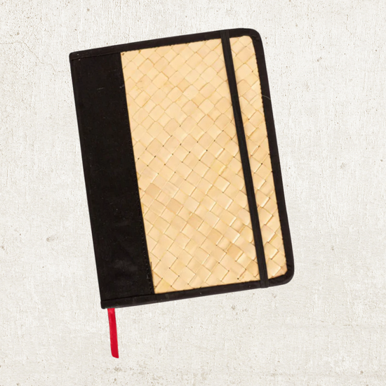 Cove Rattan & Leather Notebook handmade by Village Thrive using natural materials.