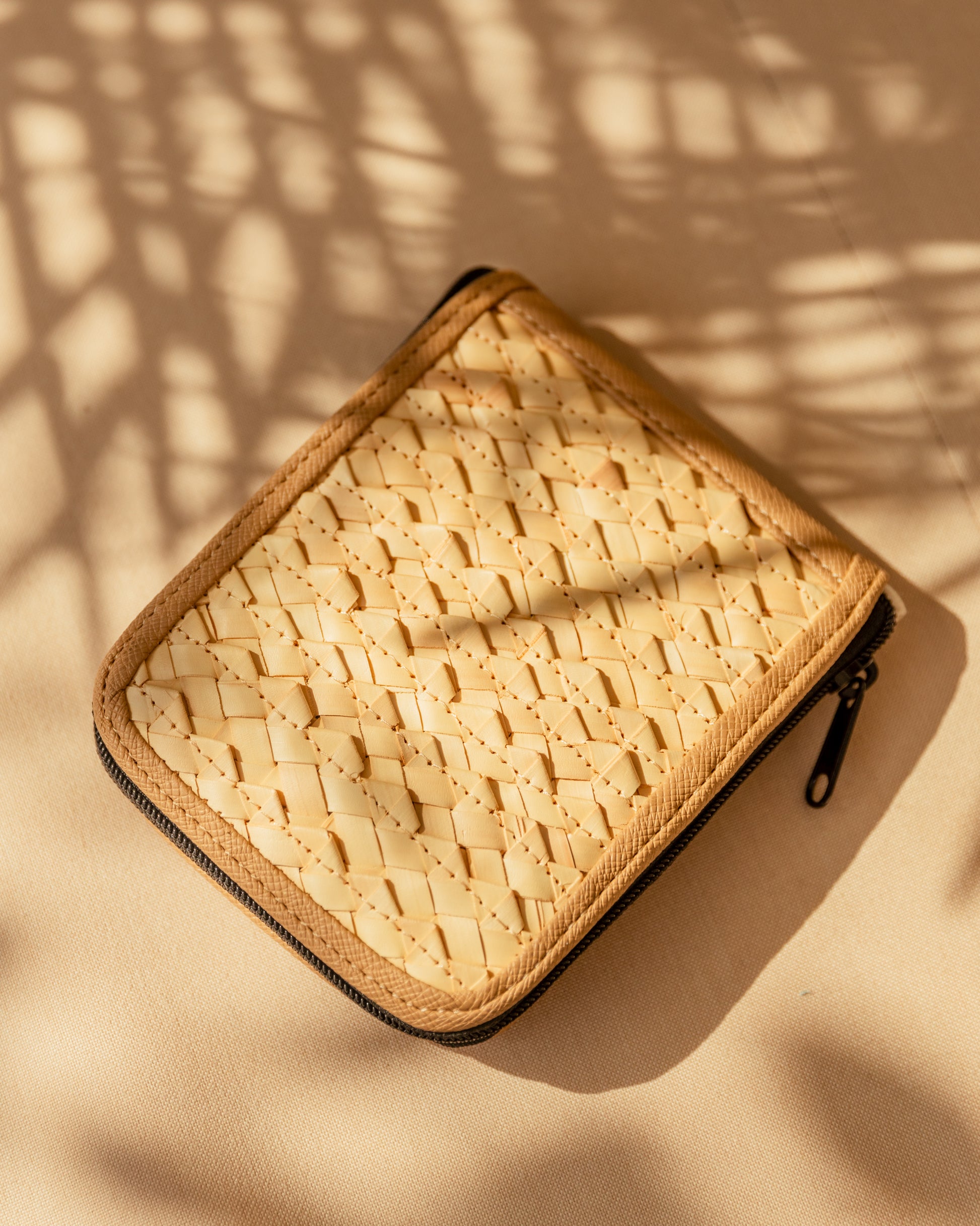 Cove Rattan & Canvas Eco Tote Bag handmade by Village Thrive using natural materials.