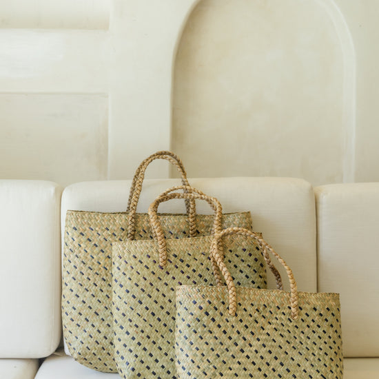 Cove Rattan Beach Tote Bag handmade by Village Thrive using natural materials.