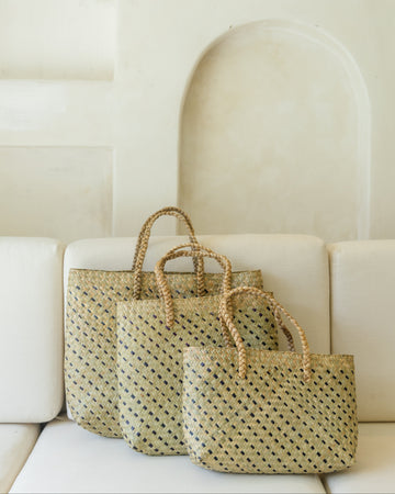 Cove Rattan Beach Tote Bag handmade by Village Thrive using natural materials.