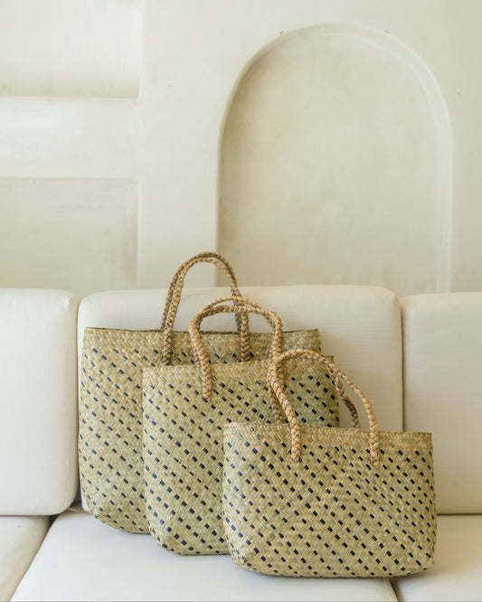 Cove Rattan Beach Tote Bag handmade by Village Thrive using natural materials.