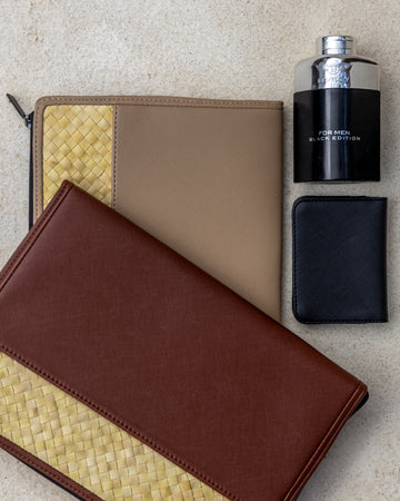 Cove Rattan & Leather Organization Pouch handmade by Village Thrive using natural materials.