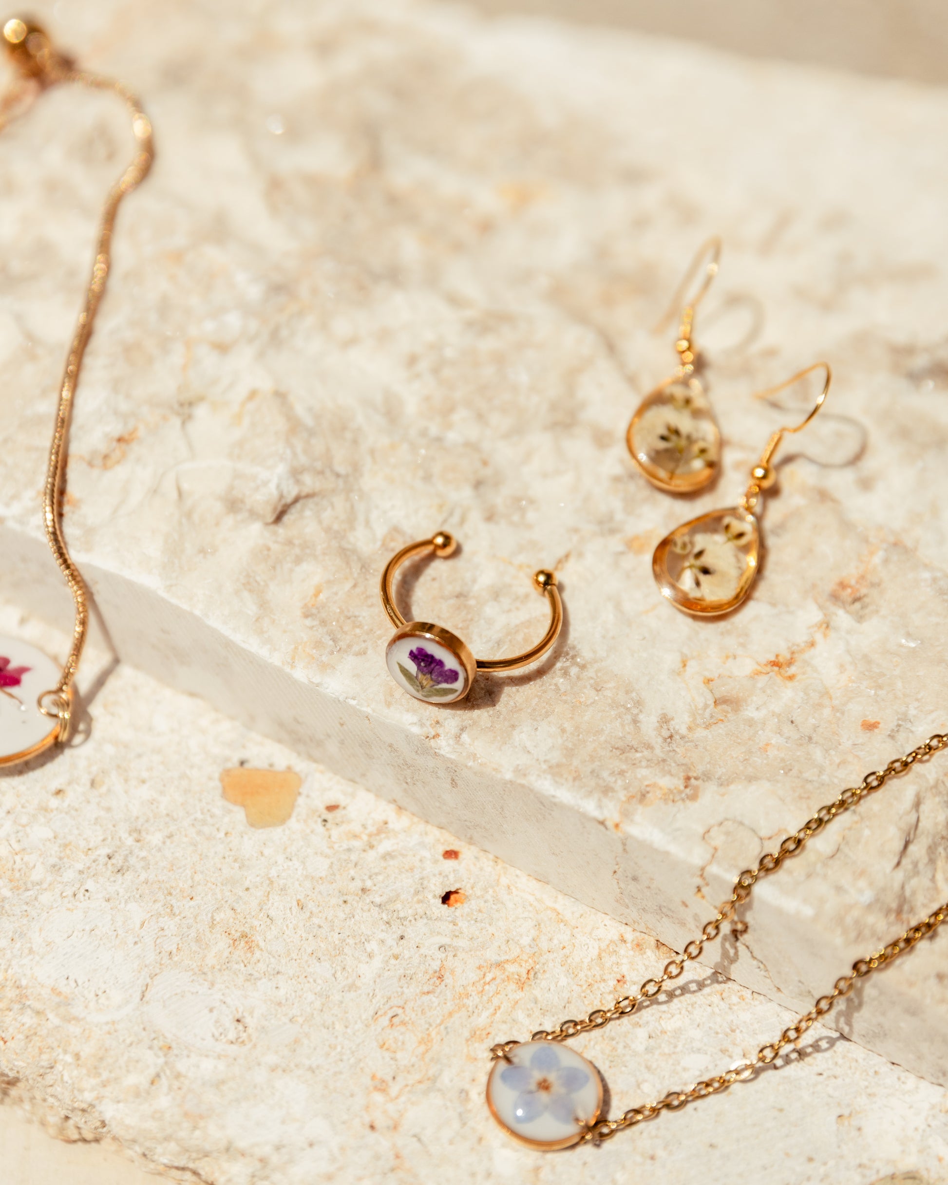 Wildflower Gold Ring handmade by Village Thrive using natural materials.