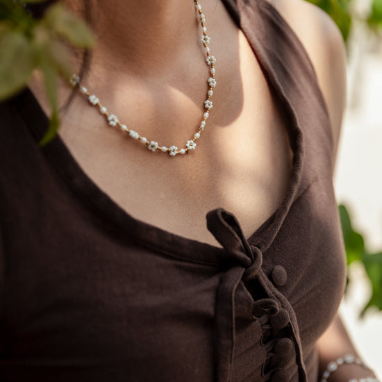 Freshwater Pearl and Flower Beaded Necklace handmade by Village Thrive using natural materials.
