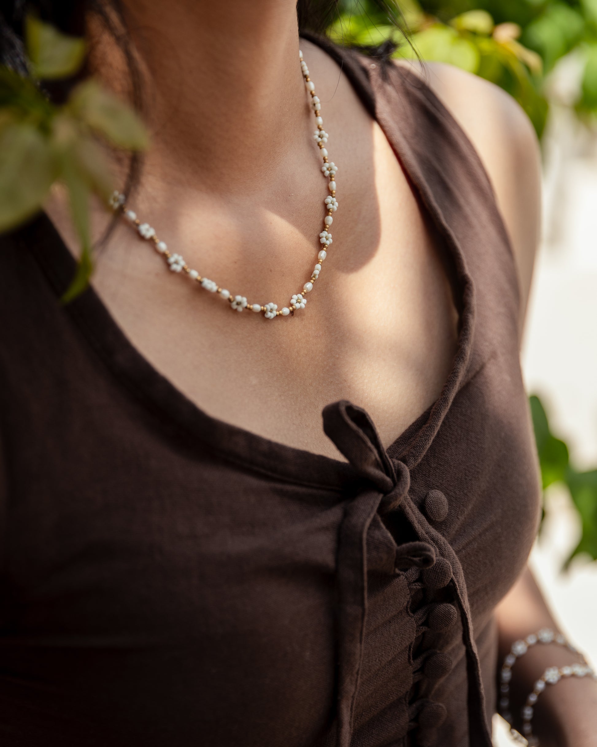 Freshwater Pearl and Flower Beaded Necklace handmade by Village Thrive using natural materials.