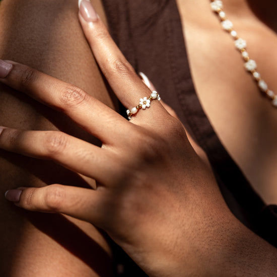 Freshwater Pearl and Flower Beaded Ring handmade by Village Thrive using natural materials.