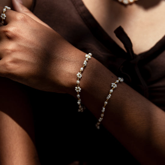 Freshwater Pearl and Flower Beaded Bracelet handmade by Village Thrive using natural materials.