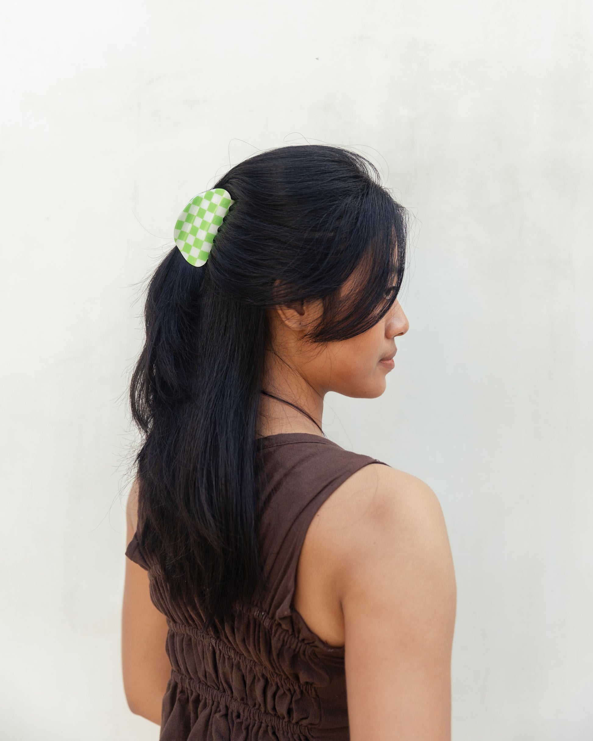 Checkered Hair Clip handmade by Village Thrive using natural materials.