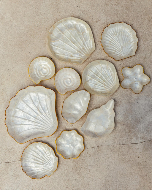 Mother of Pearl Accent Dishes handmade by Village Thrive using natural materials.