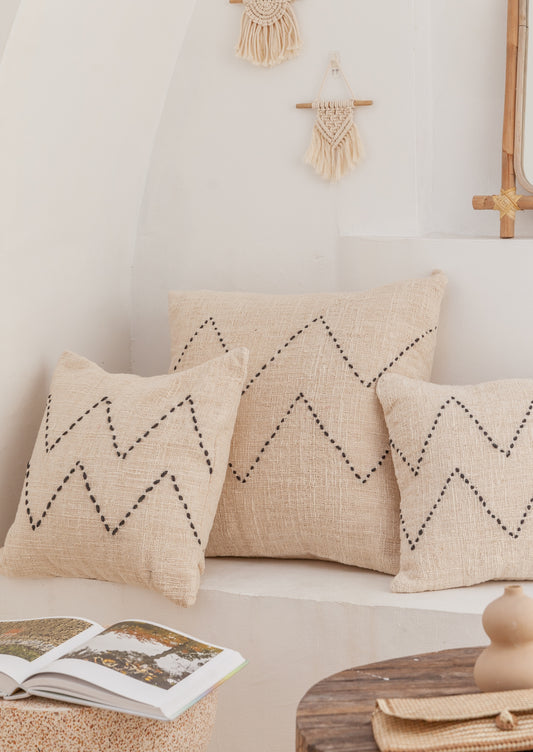 Nya Hand Stitched Cotton Throw Pillow handmade by Village Thrive using natural materials.