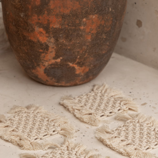 Kotak Macrame Coaster Set handmade by Village Thrive using natural materials.